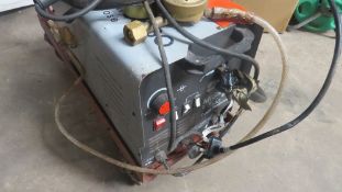 A Sip Migmate dual purpose 130 mig welder and trolley plus XXL bottle gauges