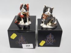 Two Royal Crown Derby cat paperweights Calico Kitten and Black & White kitten with gold stoppers and