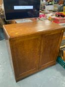 An oak two door cabinet