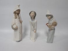 Three LLadro figurines to include a girl holding a chicken