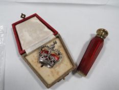 A hallmarked silver enamel marcasite brooch in the form of a Royal Crown makers mark P.M & Co in