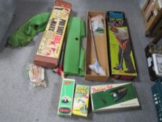 A selection of vintage golf themed toys