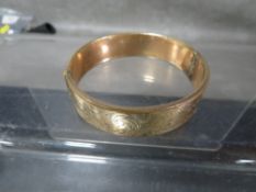 A 9ct gold metal core bangle approx weight 30.77g