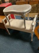 A modern white painted window seat together with a bergere silver stool. (2)