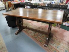 A vintage rectangular oak dining table