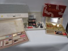 Three vintage Estee Lauder boxed make-up sets
