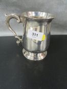 A hallmarked silver tankard approx weight 399g