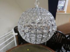 A modern circular lightshade with box- ex shop stock, may have damage