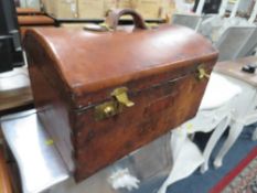 A small vintage style leather covered trunk