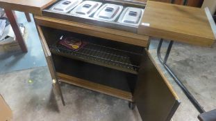 A retro Hostess trolley food warmer