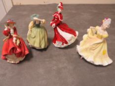 Four Royal Doulton figurines to include Buttercup and Christmas Day