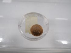 QEII 2010 gold quarter sovereign