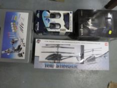 A tray of assorted collectables to include a digital microscope and a gyrocopter etc