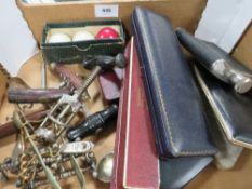A tray of assorted collectables to include corkscrews, billiard balls etc