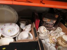 Two trays of assorted ceramics to include antique twin handled cup and saucer style examples