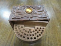 A vintage Chinese carved wooden cigarette box