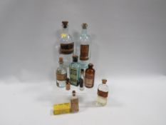 A small tray of assorted apothecary bottles etc