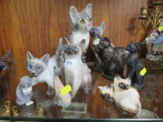 A collection of assorted cats to include Beswick, Royal Copenhagen etc