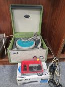 A vintage Dansette record player together with a camera etc