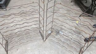 Two vintage bottle racks