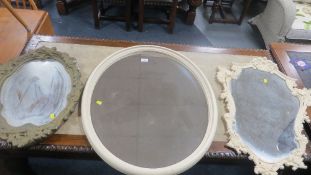 Three modern decorative wall mirrors