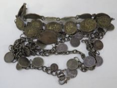 A vintage metal panel bracelet together with a coin style example