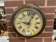 A vintage oak wallclock with modern battery movement