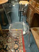 A modern IKEA perspex chair