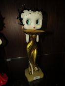 A Betty Boop in a gold dress