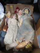 A tray of assorted antique and vintage dolls
