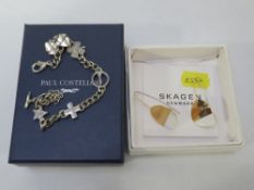 A boxed set of Skagan earrings together with a Paul Costello bracelet