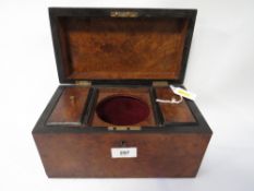 A walnut dome topped tea caddy