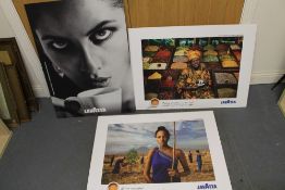 Three Lavazza advertising signs