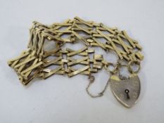 A hallmarked 9 carat gold gate bracelet approx weight 17.8g