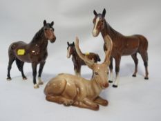 A Beswick New Forest pony together with another horse, foal and stag (4)