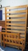 A solid pine single bed frame
