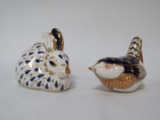 Two Royal Crown Derby Paperweights one with a gold stopper