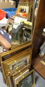 A large oval etched mirror together with a quantity of assorted pictures and prints