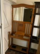 A light oak carved hall stand