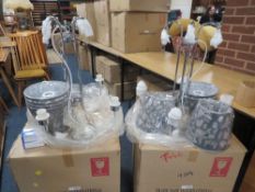 Two boxed four branch chrome chandeliers - contents not checked