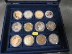 A case of collectors coins and medals, including a 5 pound crown and a Solomon Islands 2019 50th