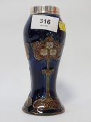 A hallmarked silver mounted Doulton Lambeth art nouveau vase with initials R B to base