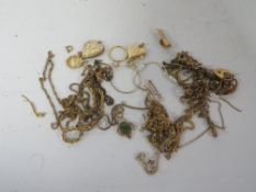 A quantity of yellow metal jewellery pieces