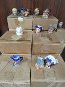 A collection of miniature Franklin Mint character jugs