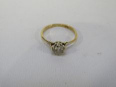 An 18ct gold dress ring set with a CZ approx weight 1.9g