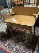 An antique pine washstand