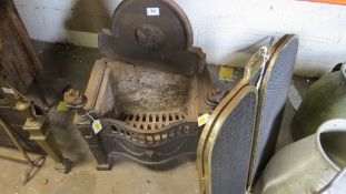 A vintage fire grate together with two fire guards