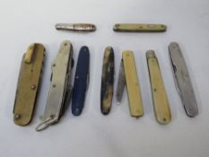A collection of assorted pocket knives etc