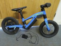 A Voltz Balance 24v child's electric bike with charger A/F