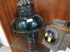 A vintage Blue green glass Hurricane lamp cover together with a vintage lantern A/F